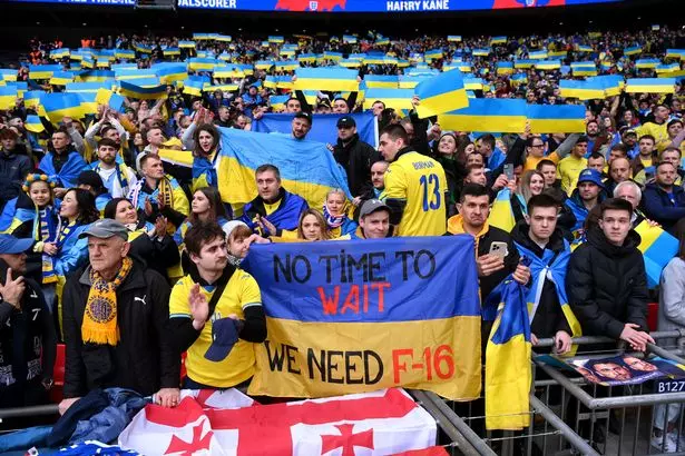 Ukrainian Fans Mock Putin with Paper Plane Gesture at Wembley Match vs. England!