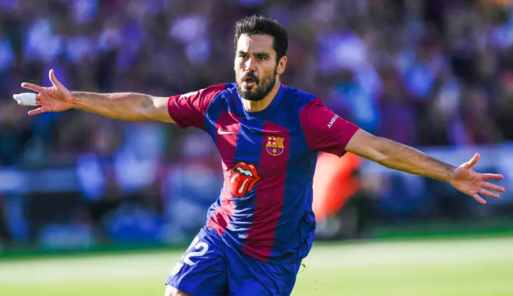 Ilkay Gundogan celebrating after scoring goal for Barcelona