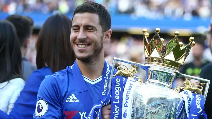 Will Chelsea take the risk to sign Eden Hazard after Real Madrid offloads him? Eden Hazard holding PL Trophy