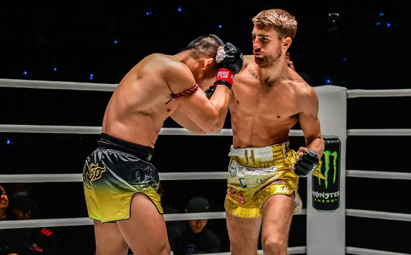The Year 2023 Was All About Jonathan Haggerty And Seksan image of Jonathan Haggerty punching Nong-O-Hama at ONE
