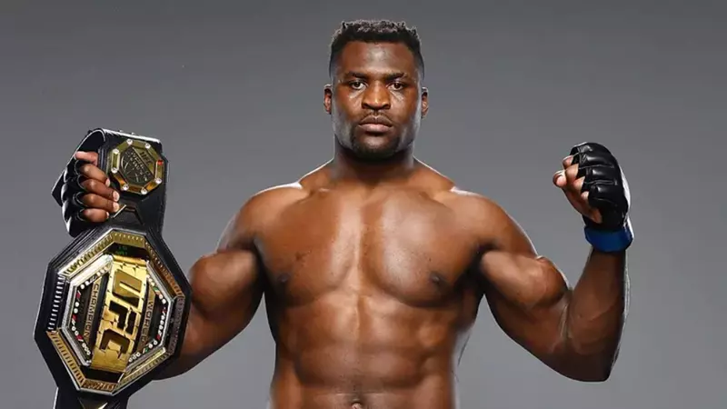 What Next For Francis Ngannou After A Great 2023 Year? Francis Ngannou posing with his UFC belt
