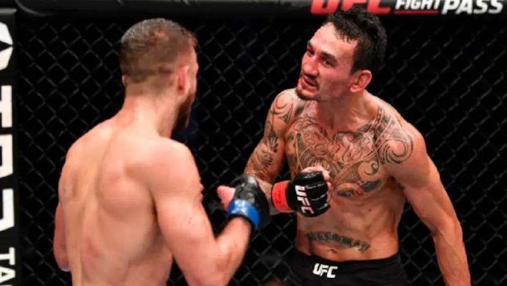 Max Holloway fighting with Calvin Kattar