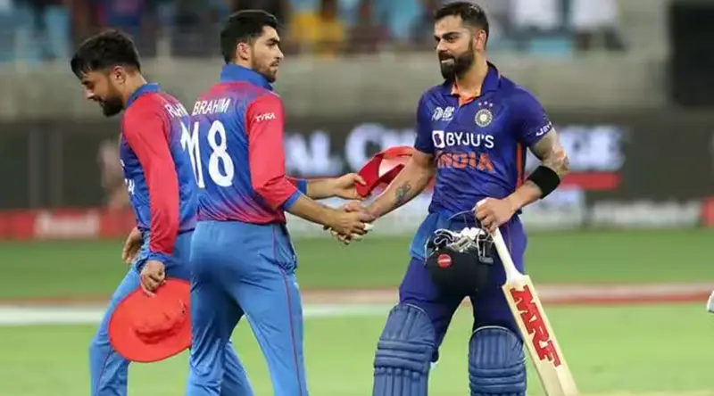 Who Will Replace Virat Kohli In The First T20I Match Against Afghanistan? Virat Kohli and Ibrahim Zadran while shaking hands