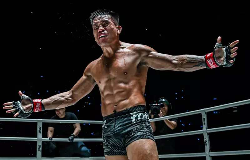 Mark Abelardo posing after winning his fight at ONE Championship