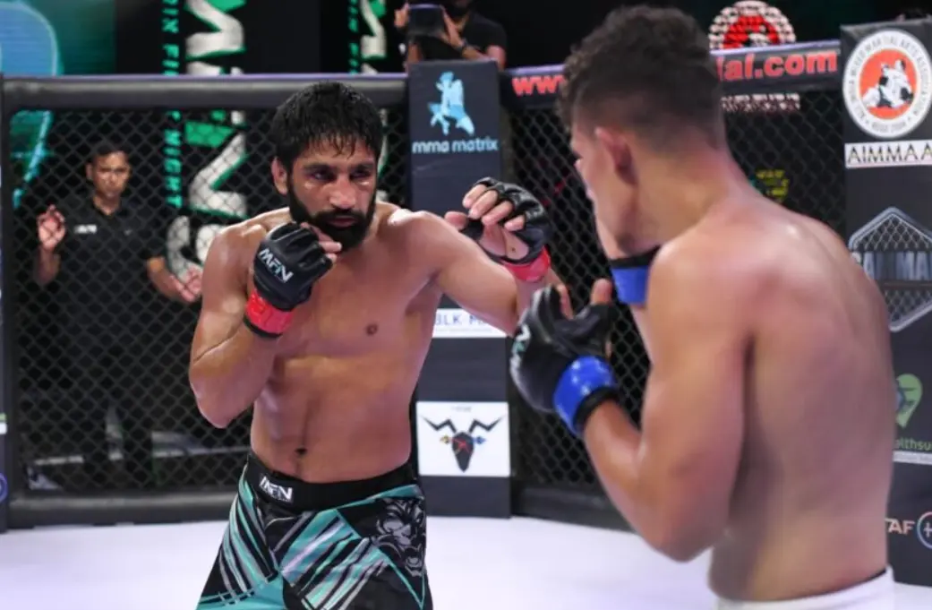 Sanjeet Budhwar inside MFN cage