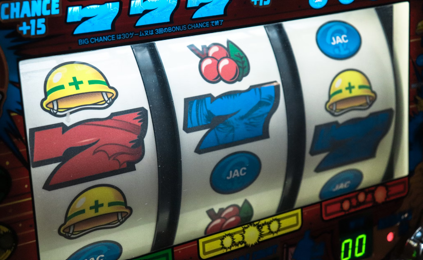 online slot machine displaying a symbol, a three seven