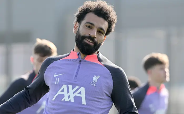 The Premier League title race intensifies as Liverpool's hopes hinge on Mohamed Salah's return against Manchester City.