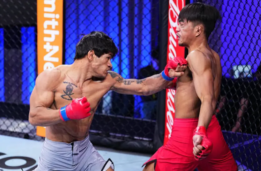 Angad Bisht Won The Round One Of The Road To UFC To Qualify For Semi-Finals Angad Bisht while punching John Dave Almanza