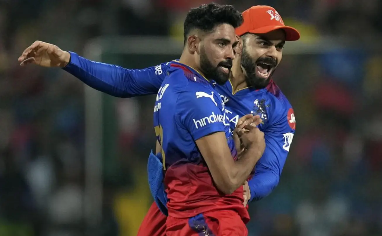 IPL 2024 62nd Match RCB vs DC: Match Results| Award Winners| Player Of The Match| Records| Scorecard RCB vs DC: Mohammed Siraj and Virat Kohli celebrating the wicket