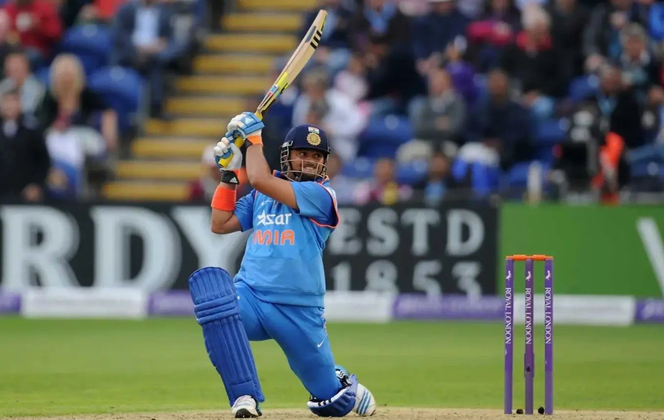 Players With Fastest Centuries In The T20 World Cup History(2007-2024) Suresh Raina while hitting a shot at covers