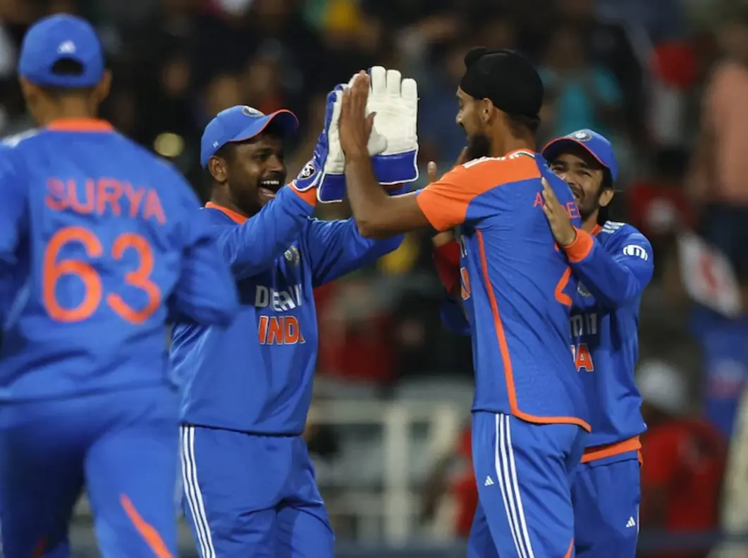 Sanju Samson and Arshdeep Singh celebrating after a wicket