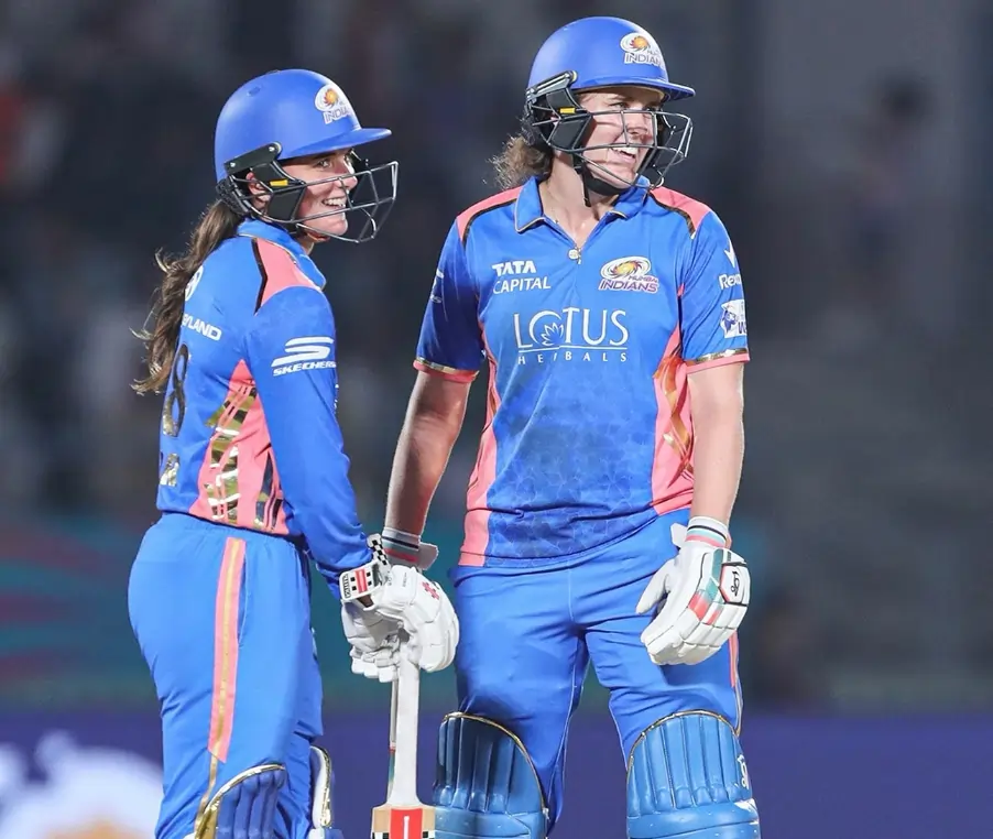 WPL 2025, Match 5th: MI vs GG: Match Highlights| Scorecard| Award Winners| Stats| POTM Nat Sciver Brunt and Amelia Kerr during a match