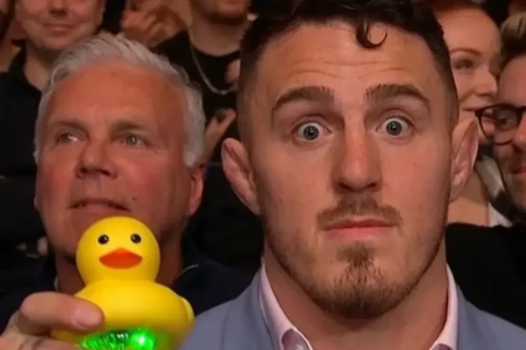 Tom Aspinall with a rubber duck
