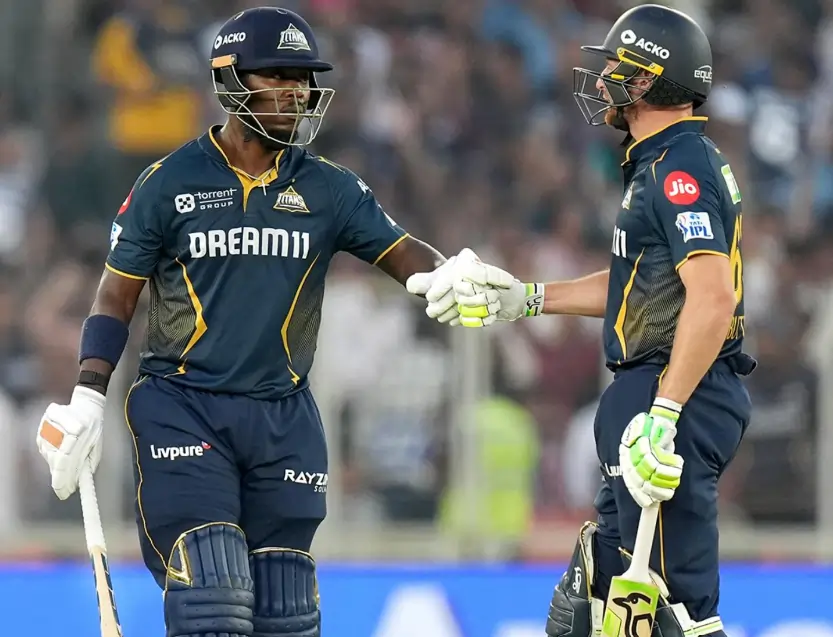 Sherfane Rutherford and Jos Buttler during an IPL match