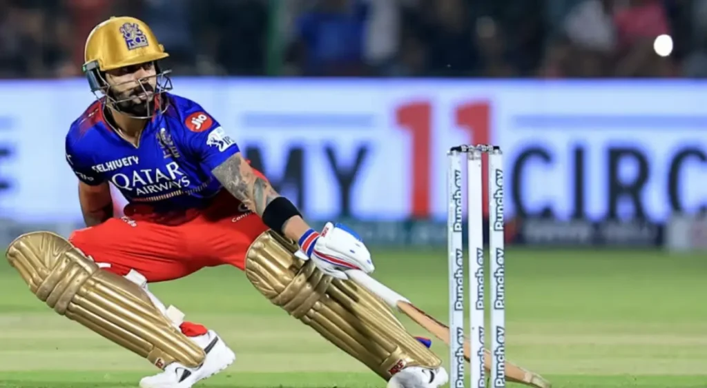 Virat Kohli while taking a run in an IPL match