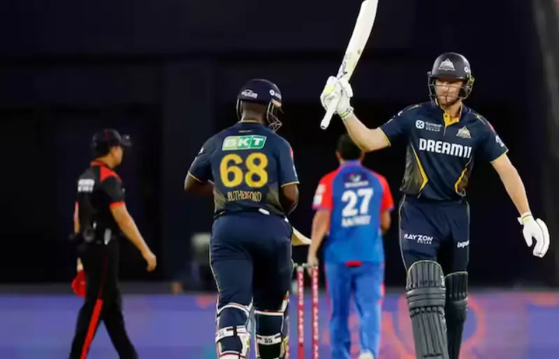 Jos Buttler and other players during an IPL match