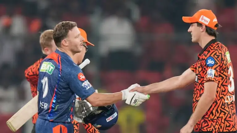 Pat Cummins and David Miller during an IPL match