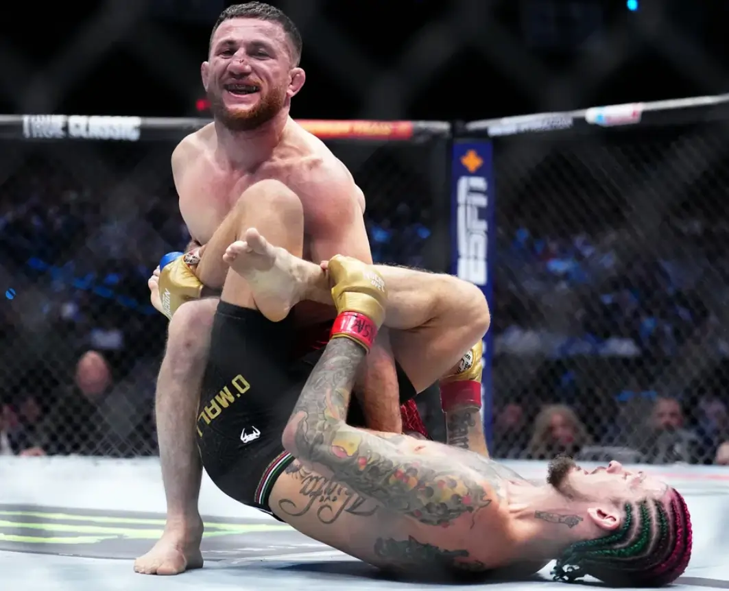 Sean O'Malley and Merab Dvalishvili during their fight