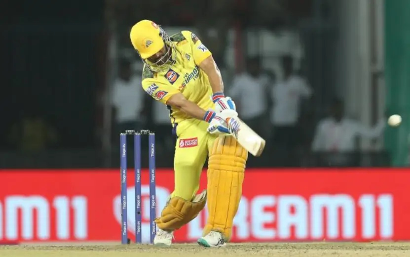 MS Dhoni while hitting a shot during an IPL match
