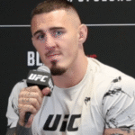 Tom Aspinall during a press conference
