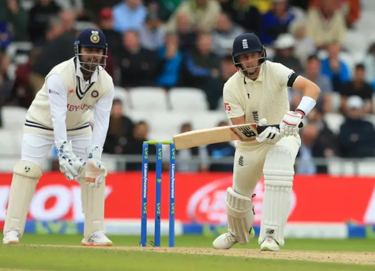 Joe Root and Rishabh Pant during a test match
